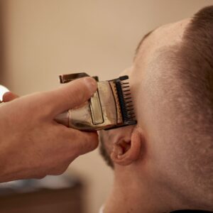 man getting head shaved