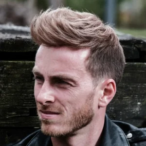 Man with styled light wavy hair in side profile showcasing Hairskeen Explorer Hybrid hair system